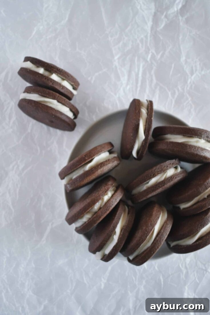 Homemade Oreo cookies on a plate.