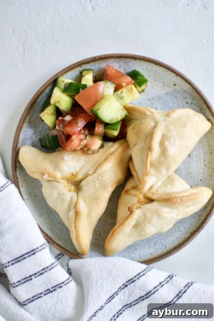 Jo's Fatayar A Disappointing Experience 6 A beautifully arranged serving of Joanna Gaines' Jo's Fatayar with Lebanese Salad on a plate, ready to be enjoyed.