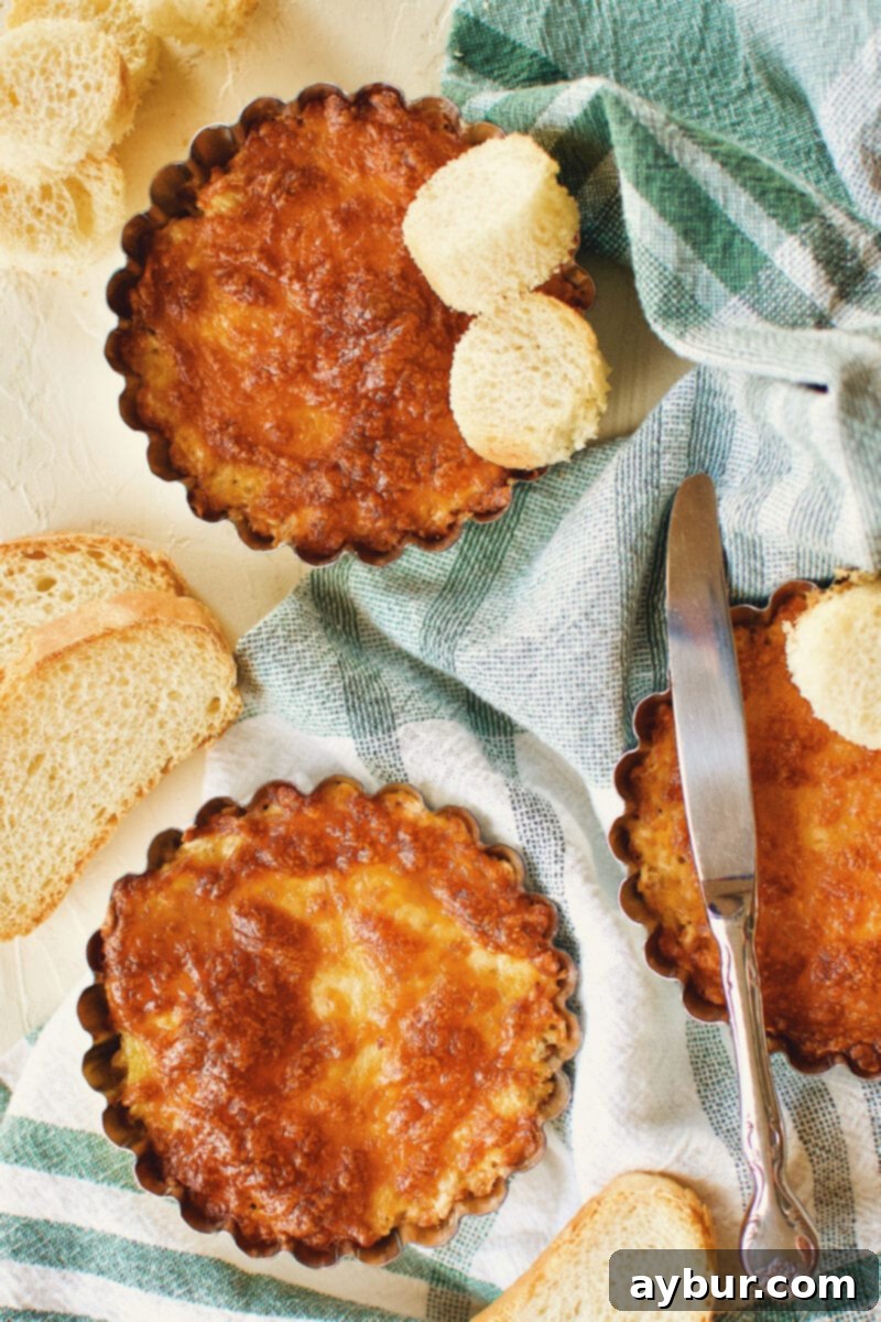 The finished Artichoke Three Cheese Dip, bubbling hot and golden brown from the oven.