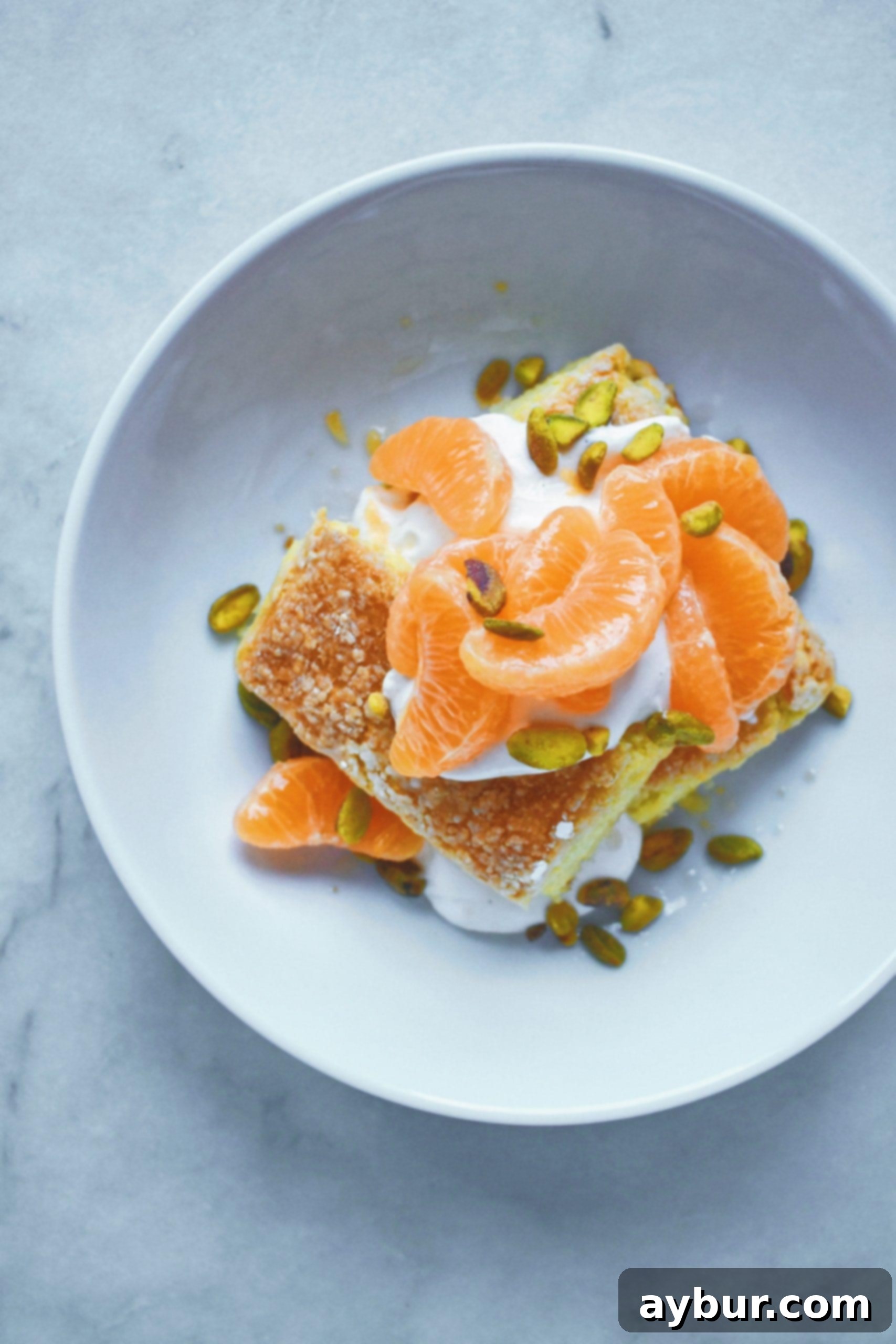 Clementine shortcake in a bowl, ready to eat.