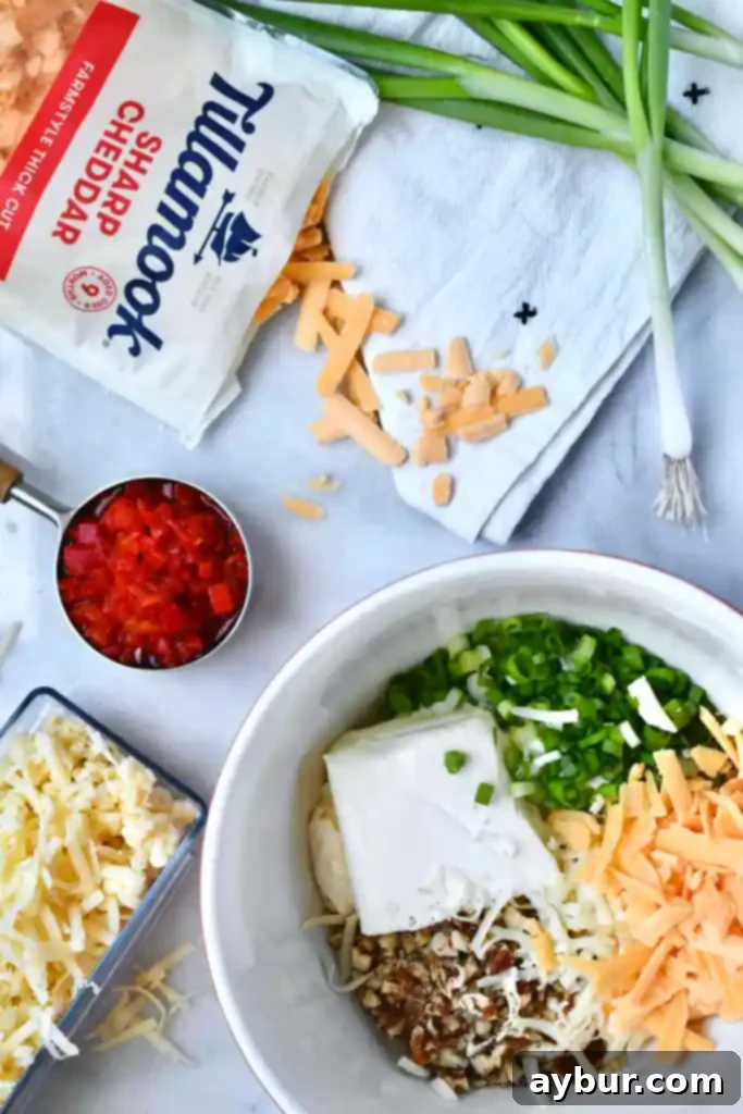 Fresh, high-quality ingredients for a modern take on Joanna Gaines' 1919 Pimento Cheese, prepared by KendellKreations, featuring Tillamook cheese for superior flavor.