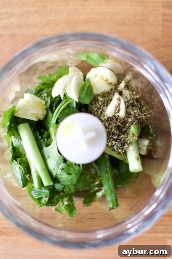 Chicken herb rub before chopping.