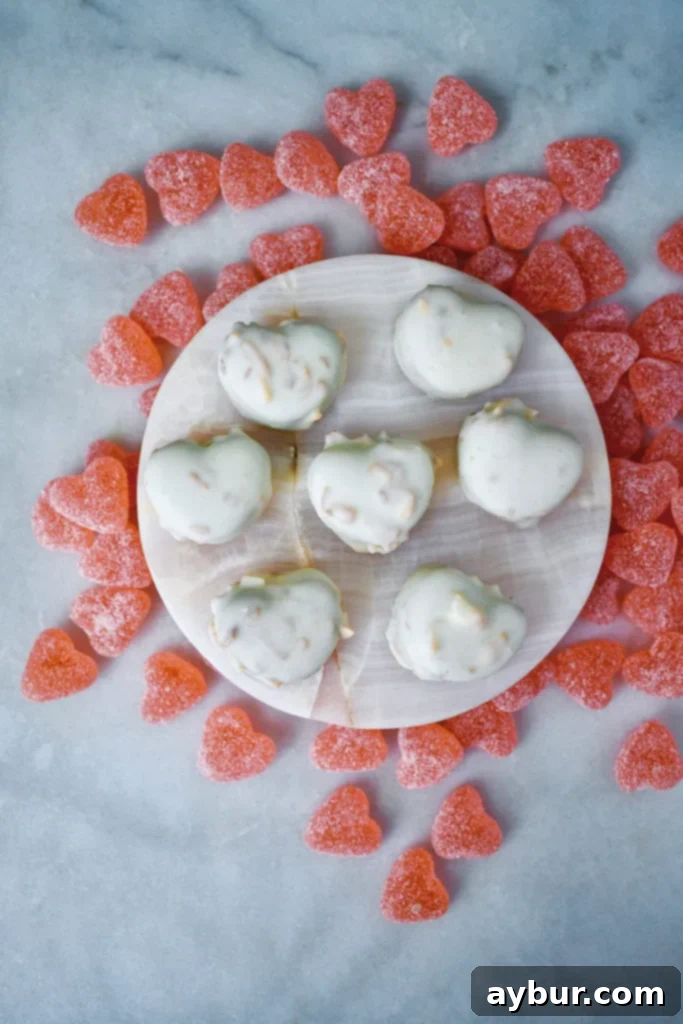 Hand holding a heart-shaped Homemade Trinidad Truffle