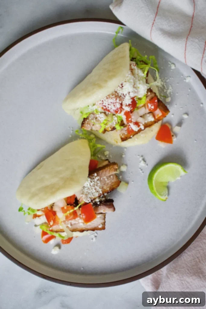Crackling Pork Belly 5 Crispy Pork Belly Bao Buns topped with Pico de Gallo and cotija cheese