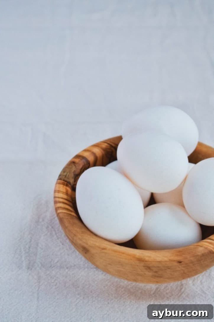 Golden Herb Roasted Potato Salad 6 Perfectly jammy soft-boiled eggs in a bowl, ready to be peeled and added to the potato salad.