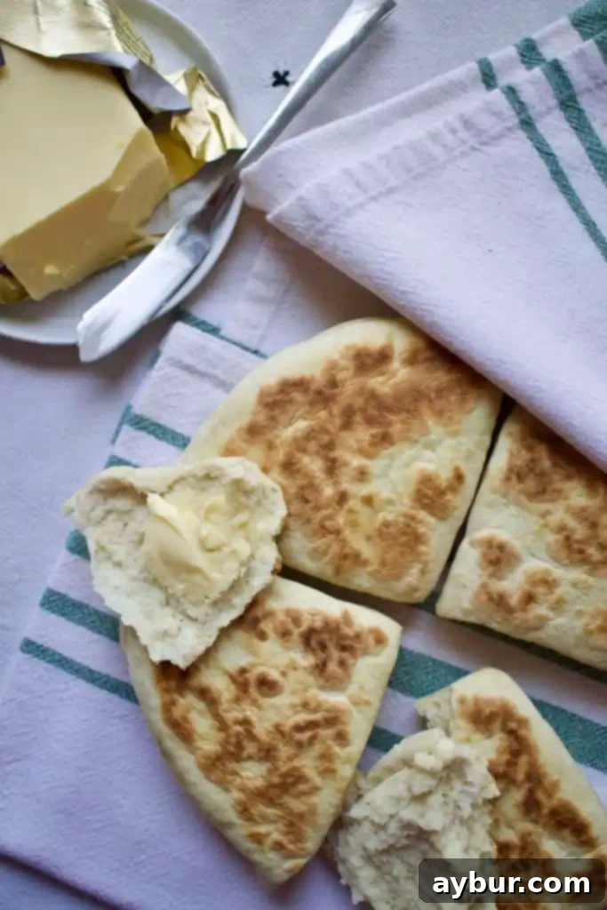 Rustic Irish Soda Bread 2 Traditional Irish Griddle Soda Bread served with creamy Irish butter on a wooden board