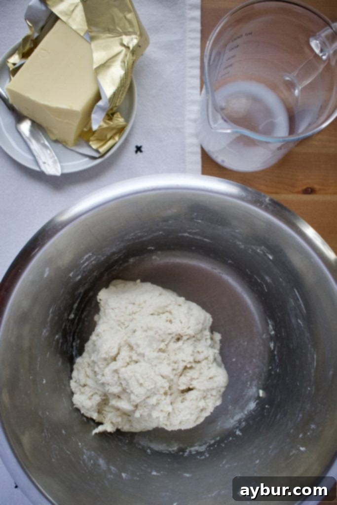 Rustic Irish Soda Bread 4 Buttermilk being poured into the dry soda bread mixture