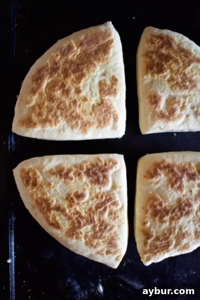Rustic Irish Soda Bread 9 Traditional Irish Griddle Soda Bread cooking on a dry griddle, showing its rising texture