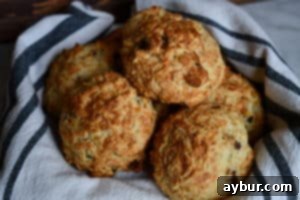 Close-up of a perfectly baked bacon and Gruyère drop biscuit
