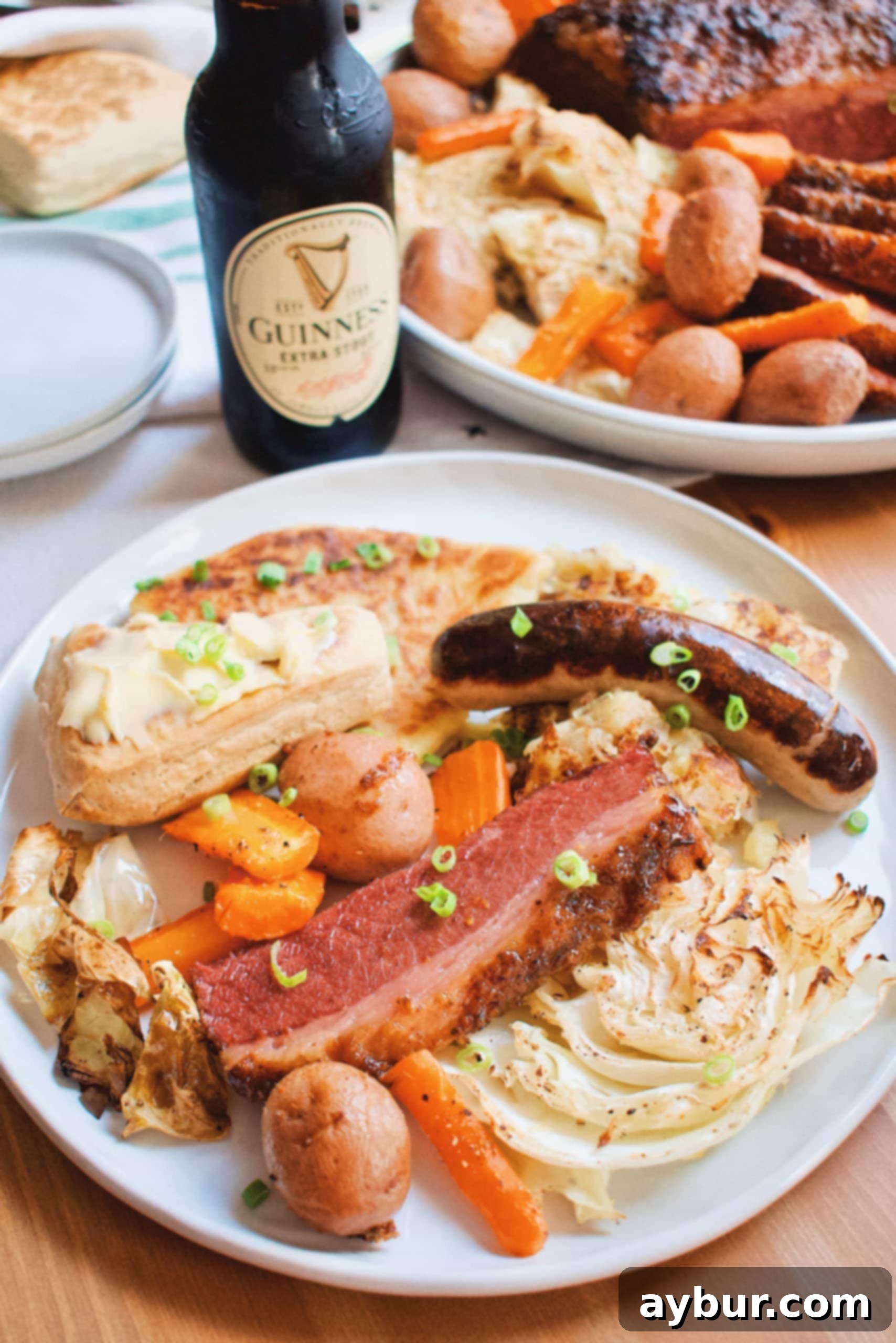 A festive St. Patrick's Day spread featuring Corned Beef and Cabbage, alongside traditional Irish dishes like Bangers, Colcannon, Soda Bread, and Potato Bread.