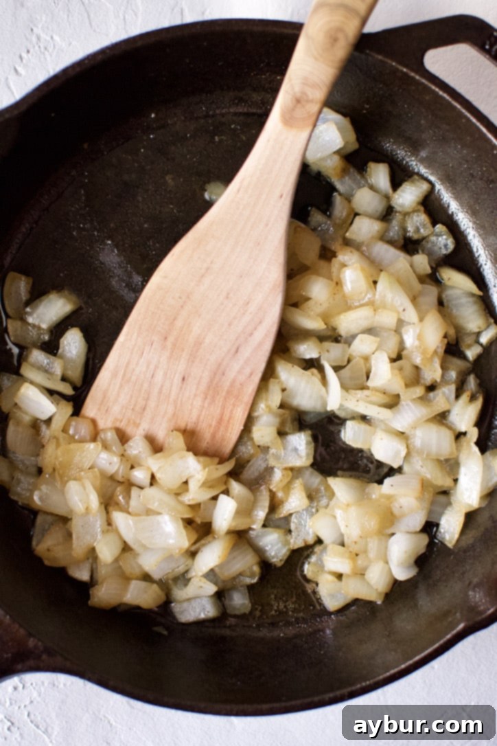 Sauteed onions and butter in a cast-iron pan.