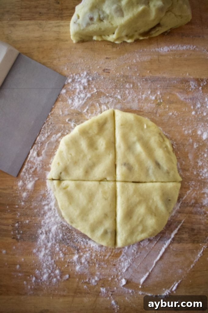Golden brown Irish potato bread on a griddle.
