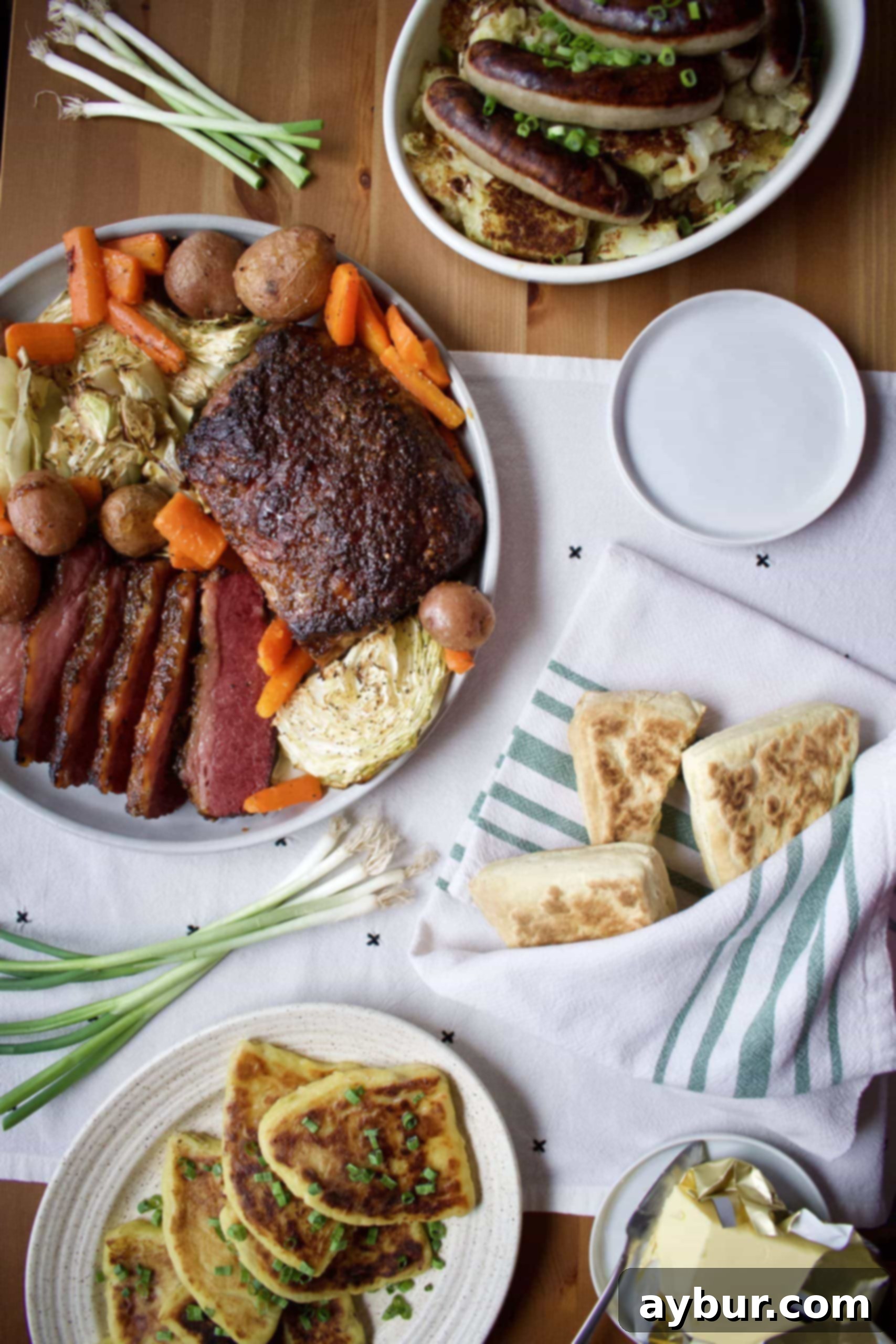 A classic Irish-American feast laid out on a table, featuring corned beef, cabbage, and potatoes.