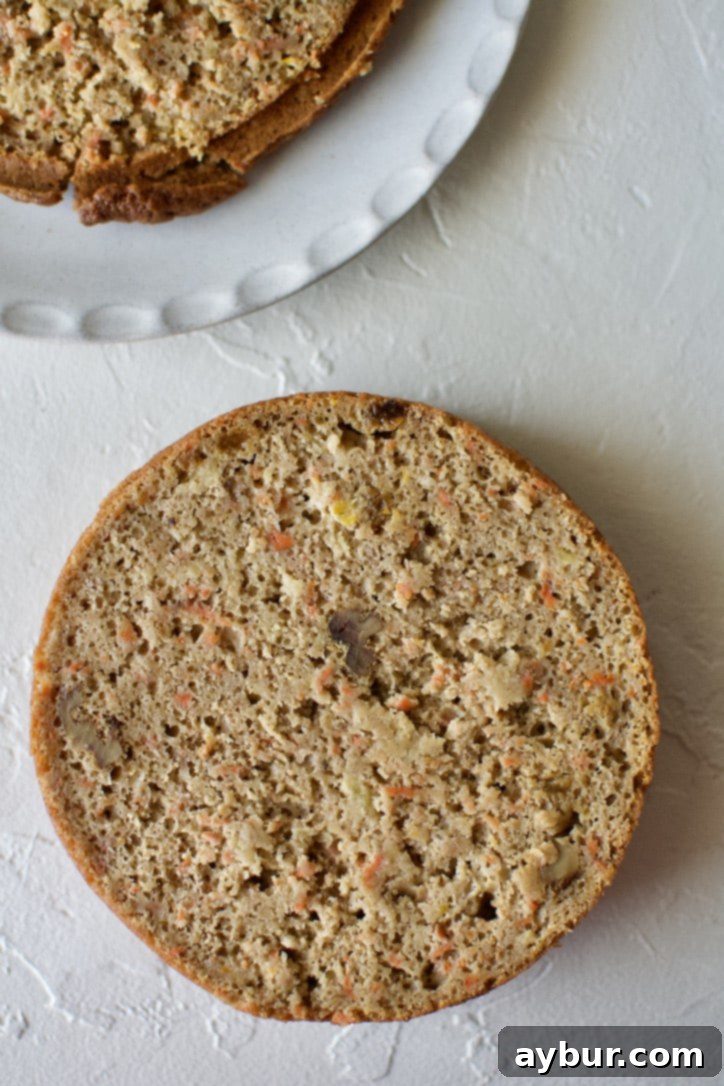 A freshly torted cake layer, with its top trimmed flat for easy stacking and frosting.