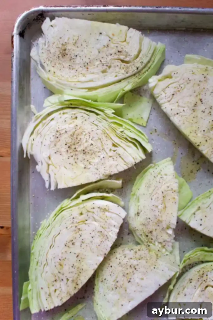 Flaky Seared Salmon with Tender Roasted Cabbage and Sweet Corn Salad 4 Thickly sliced green cabbage steaks seasoned and ready for roasting