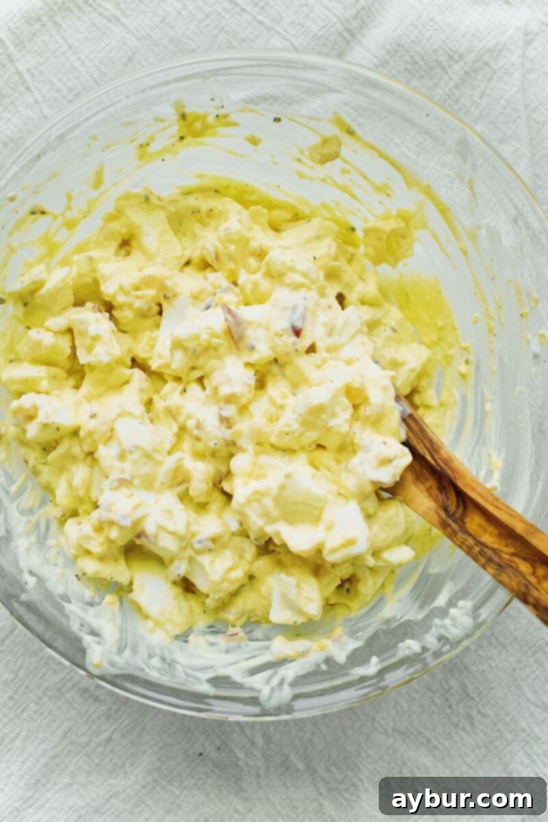 Scandinavian Dill Egg Salad 8 Egg Salad mixed in a bowl, creamy and ready for serving.