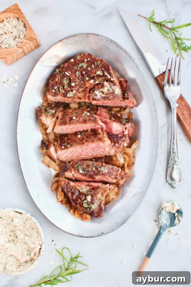 Grilled Ribeye with Steak Butter on top