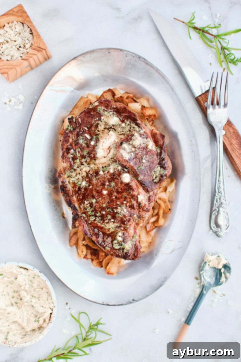 Grilled Ribeye with Steak Butter on top