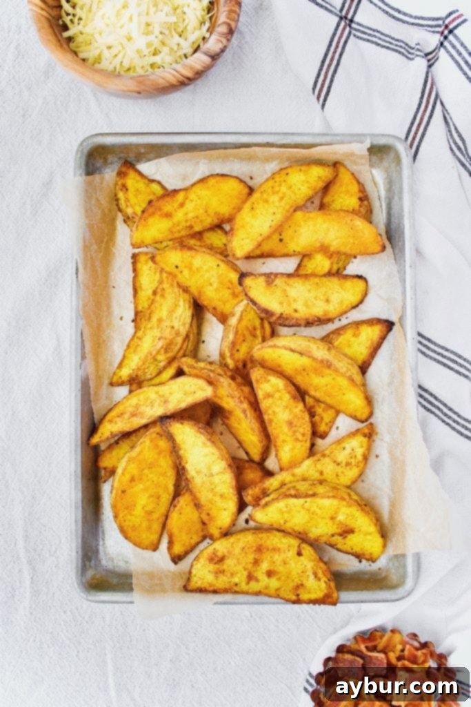Turmeric Gold Cheesy Fries 4 Turmeric Potato Wedges after roasting