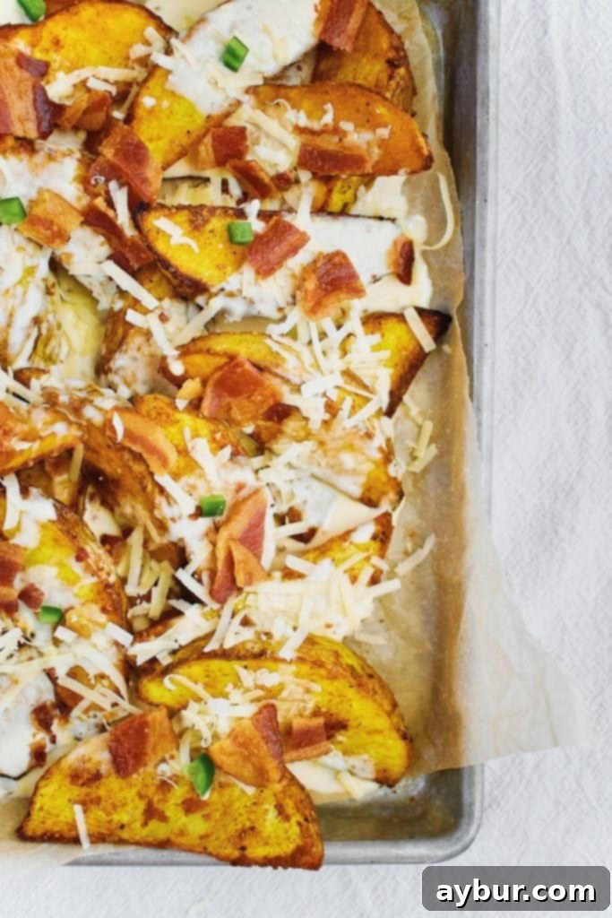 Turmeric Gold Cheesy Fries 5 Turmeric Cheese Fries topped with Bacon, Cheese Sauce, Jalapeno pieces, and white cheddar