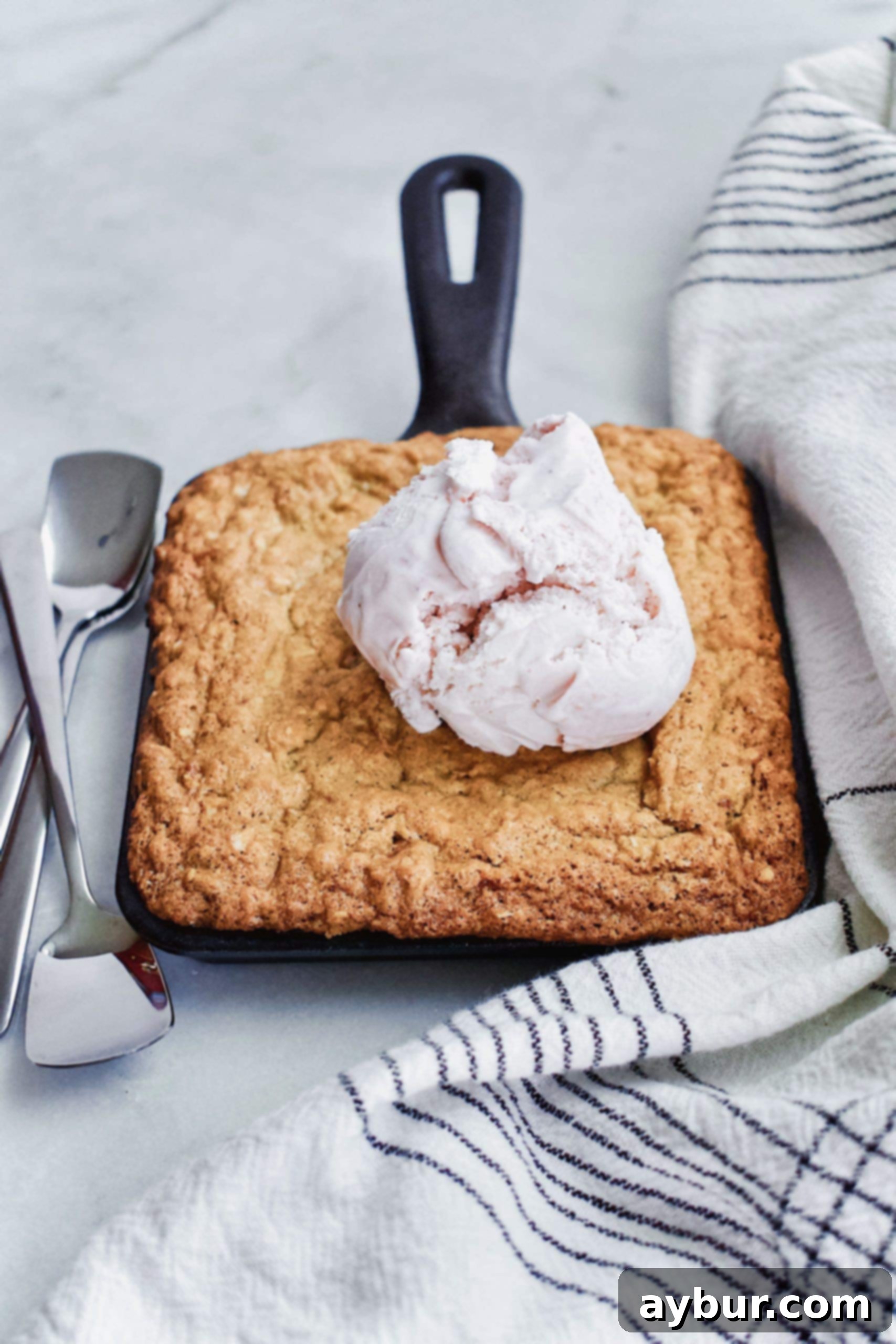 Joanna Gaines Silo Cookie in a skillet with ice cream