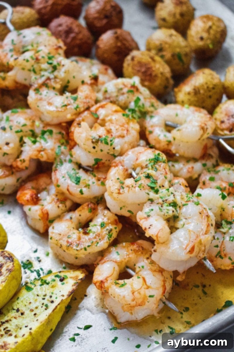 Zesty Lemon Garlic Grilled Shrimp Skewers 6 Grilled Shrimp Skewers with vegetables on the grill