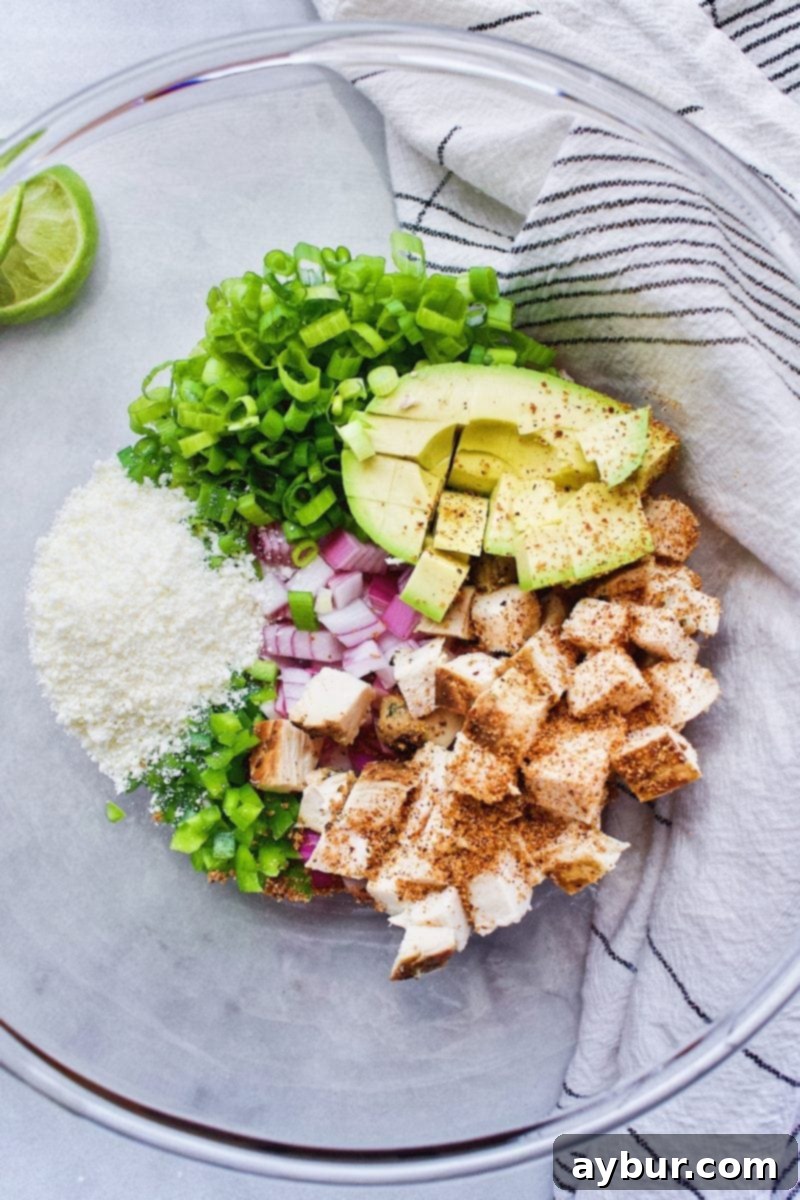 chicken salad base with onions, jalapeno, avocado and chicken for Mexican Street Corn Chicken Salad