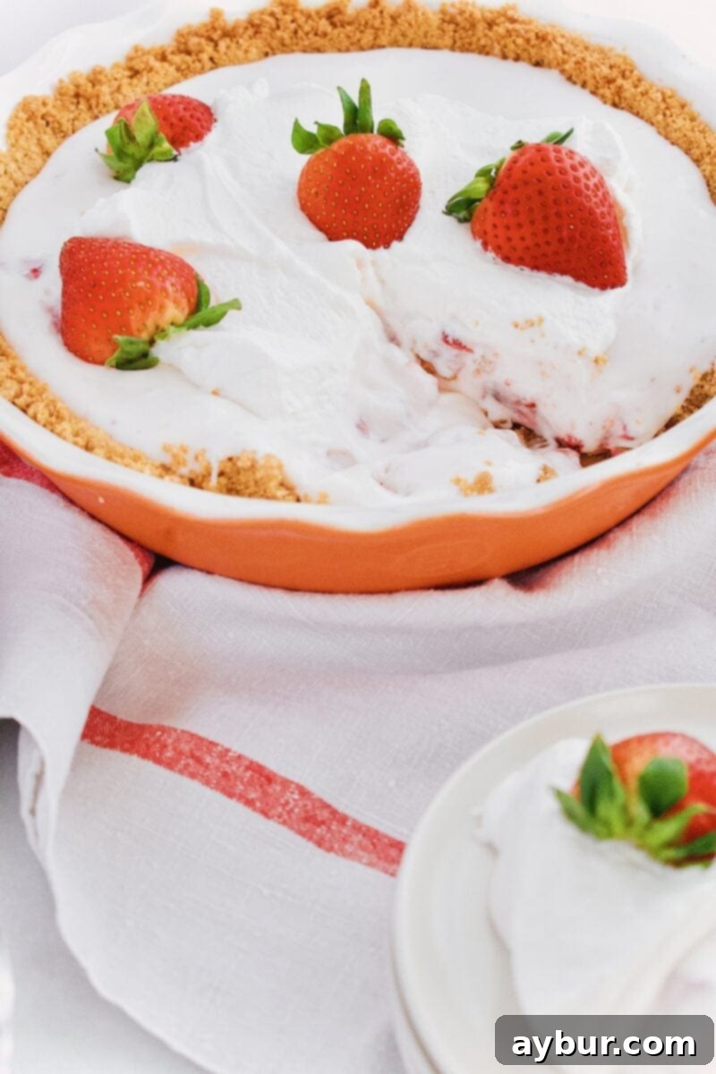 Joanna Gaines Strawberry Pie from the Magnolia Table Cookbook served on white plates