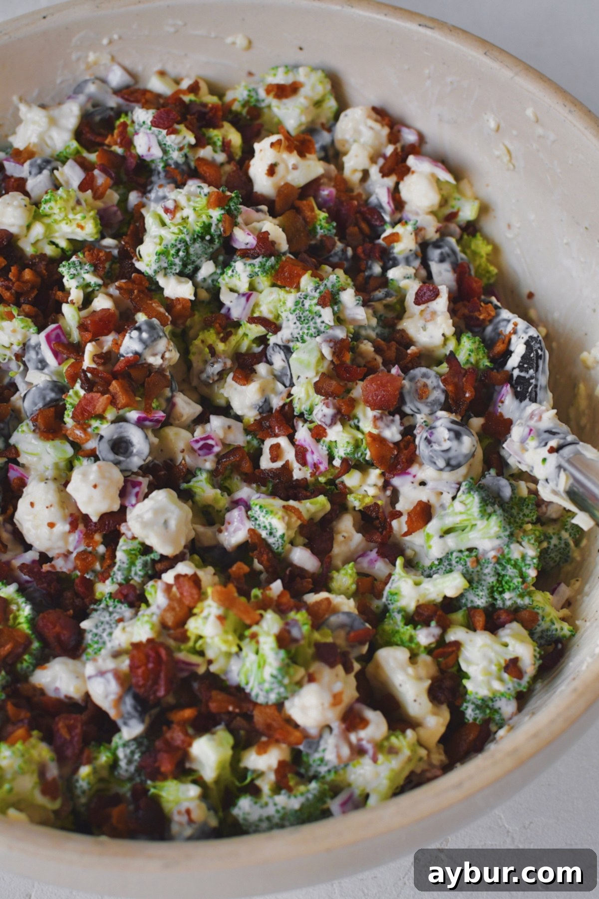 Vibrant Broccoli and Cauliflower Power Salad 9 Broccoli and Cauliflower Salad just after mixing, more bacon added on top just before serving.