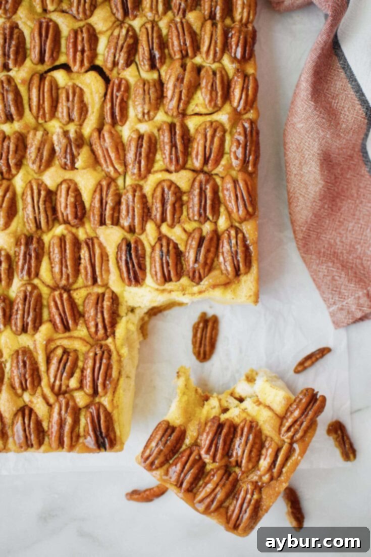 Irresistible Pumpkin Pecan Praline Sticky Buns with a rich caramel sauce