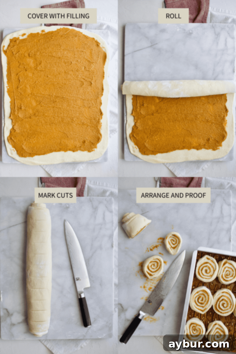 The process of spreading pumpkin filling on the rolled dough and then slicing it into individual sticky bun portions