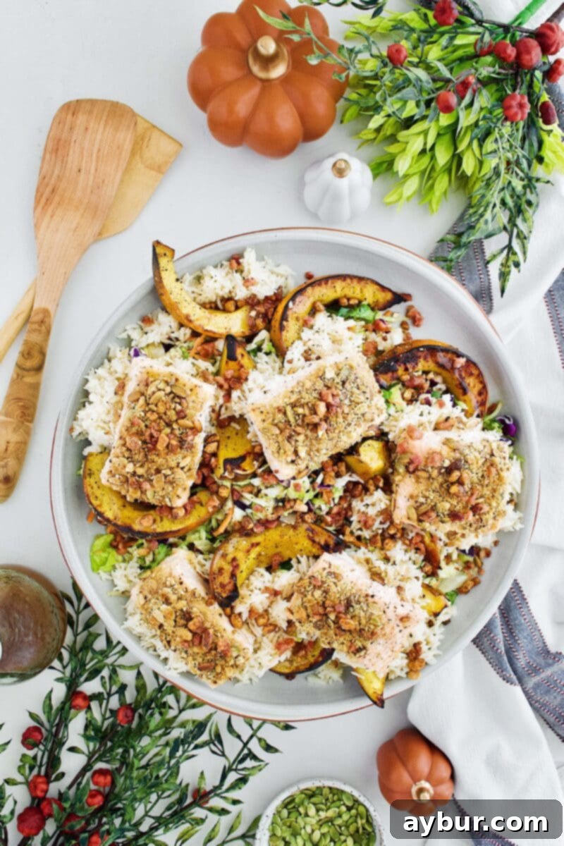 Pepita Crusted Salmon Salad with vibrant greens and roasted pumpkin
