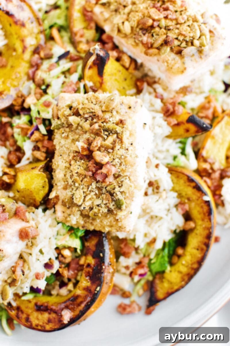 Close-up of Pepita Crusted Salmon Salad showing texture and freshness