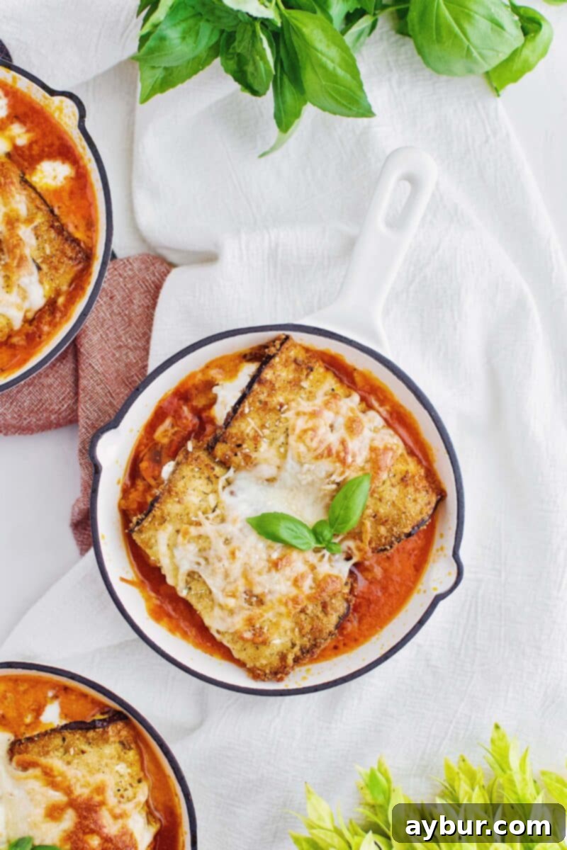 Classic Eggplant Parmesan Rollatini dish with savory bolognese base