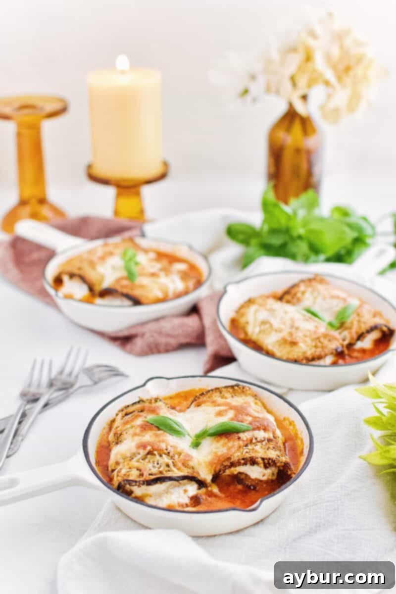 A beautifully baked dish of Eggplant Parmesan Rollatini, fresh from the oven
