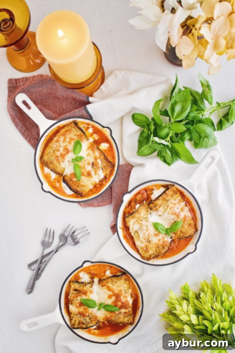 Eggplant Parmesan Rollatini in small 6 inch cast iron skillets