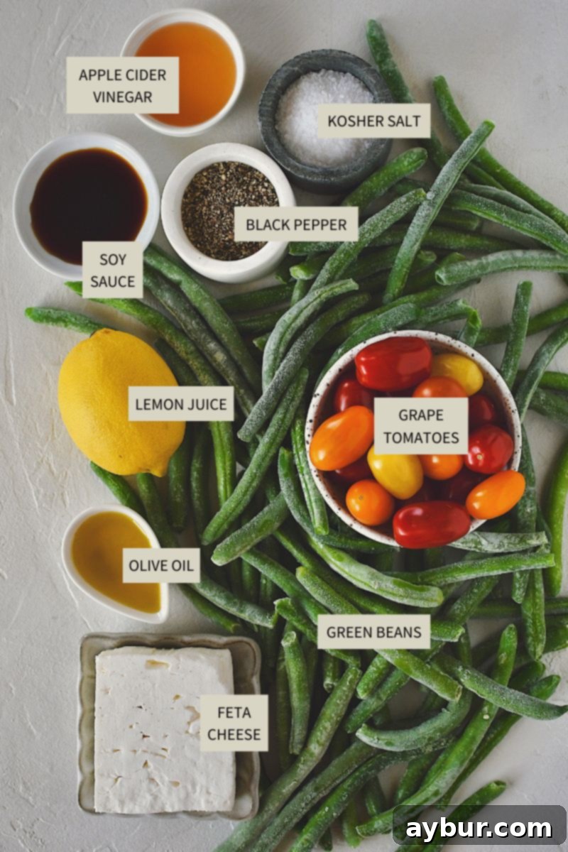 Vibrant Green Bean Salad 3 Ingredients needed to make Green Bean Salad. Fresh green beans, cherry tomatoes, feta, basil, olive oil, lemon, soy sauce, and apple cider vinegar.