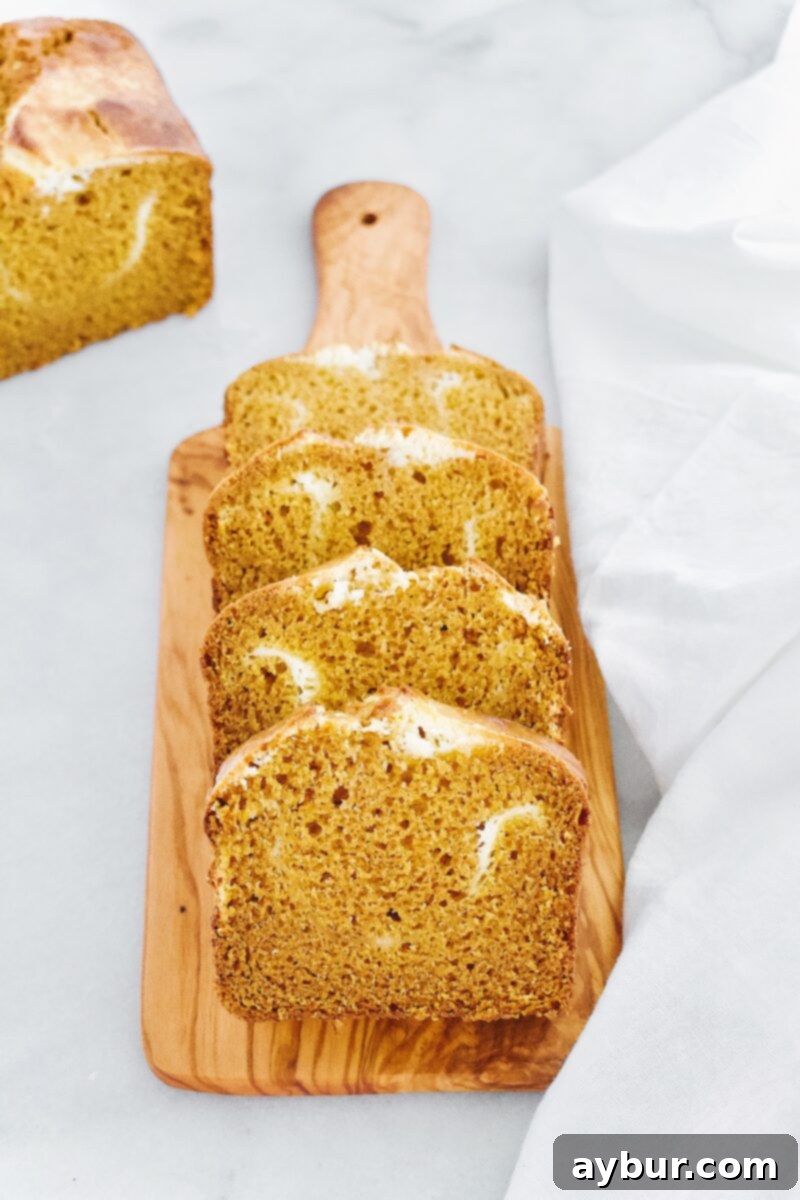 A perfectly baked Joanna Gaines Pumpkin Cream Cheese Loaf, showcasing its golden-brown crust and inviting texture.