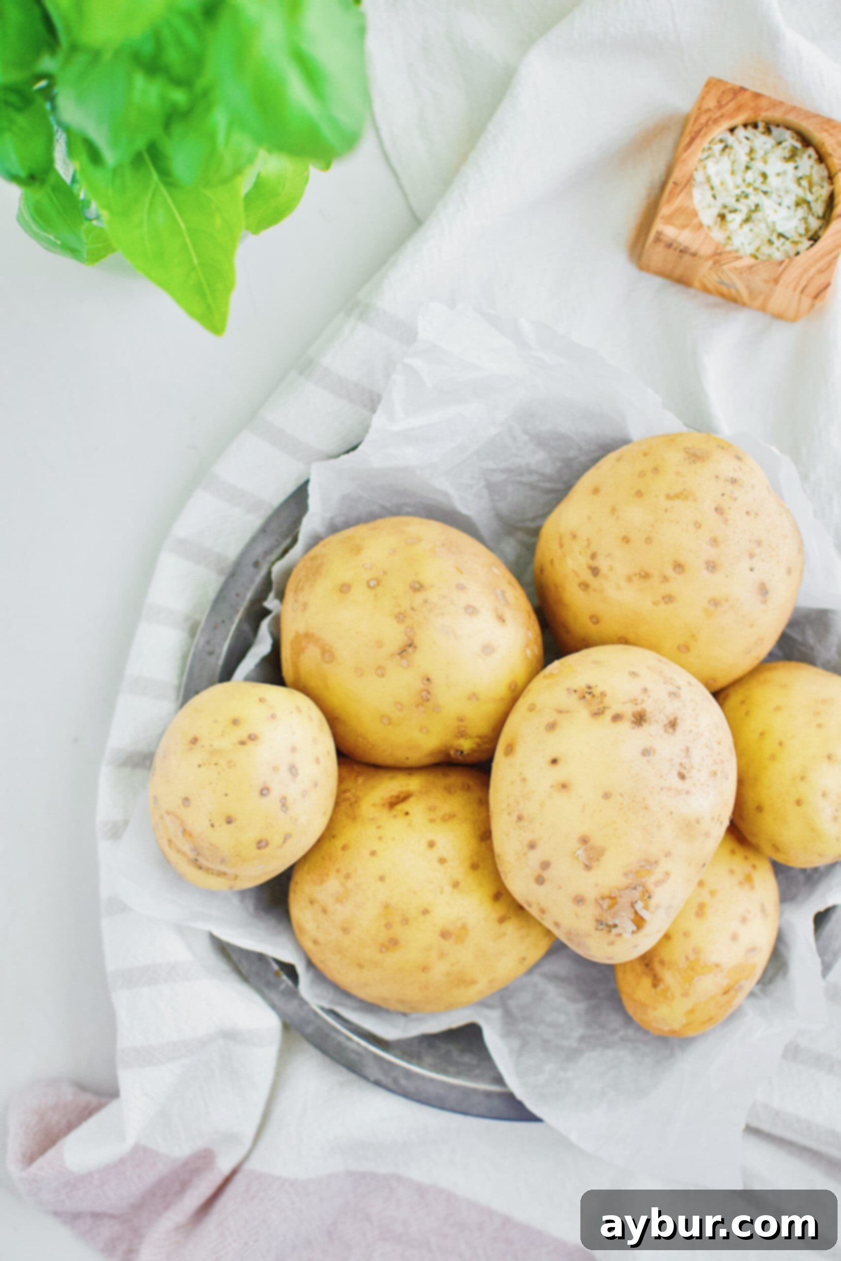 Homemade Fries Made Easy 3 Cleaned Yukon Gold potatoes ready for slicing