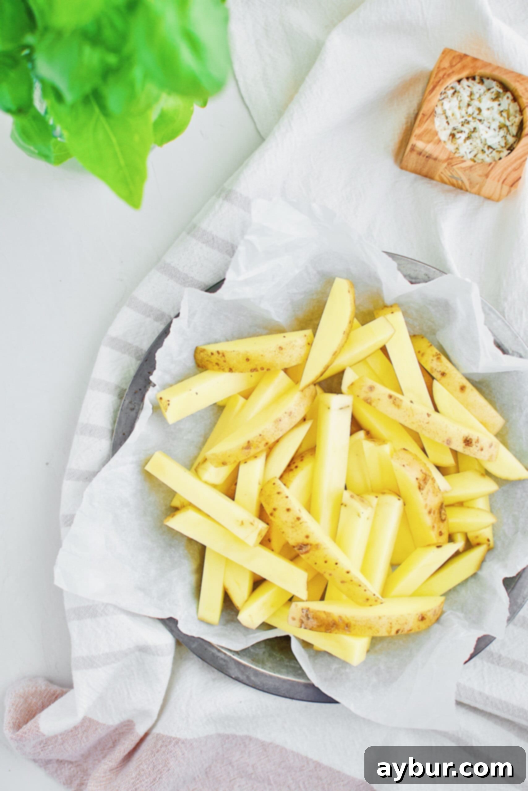 Homemade Fries Made Easy 4 Yukon Gold potatoes precisely cut into uniform ½-inch thick french fry sticks