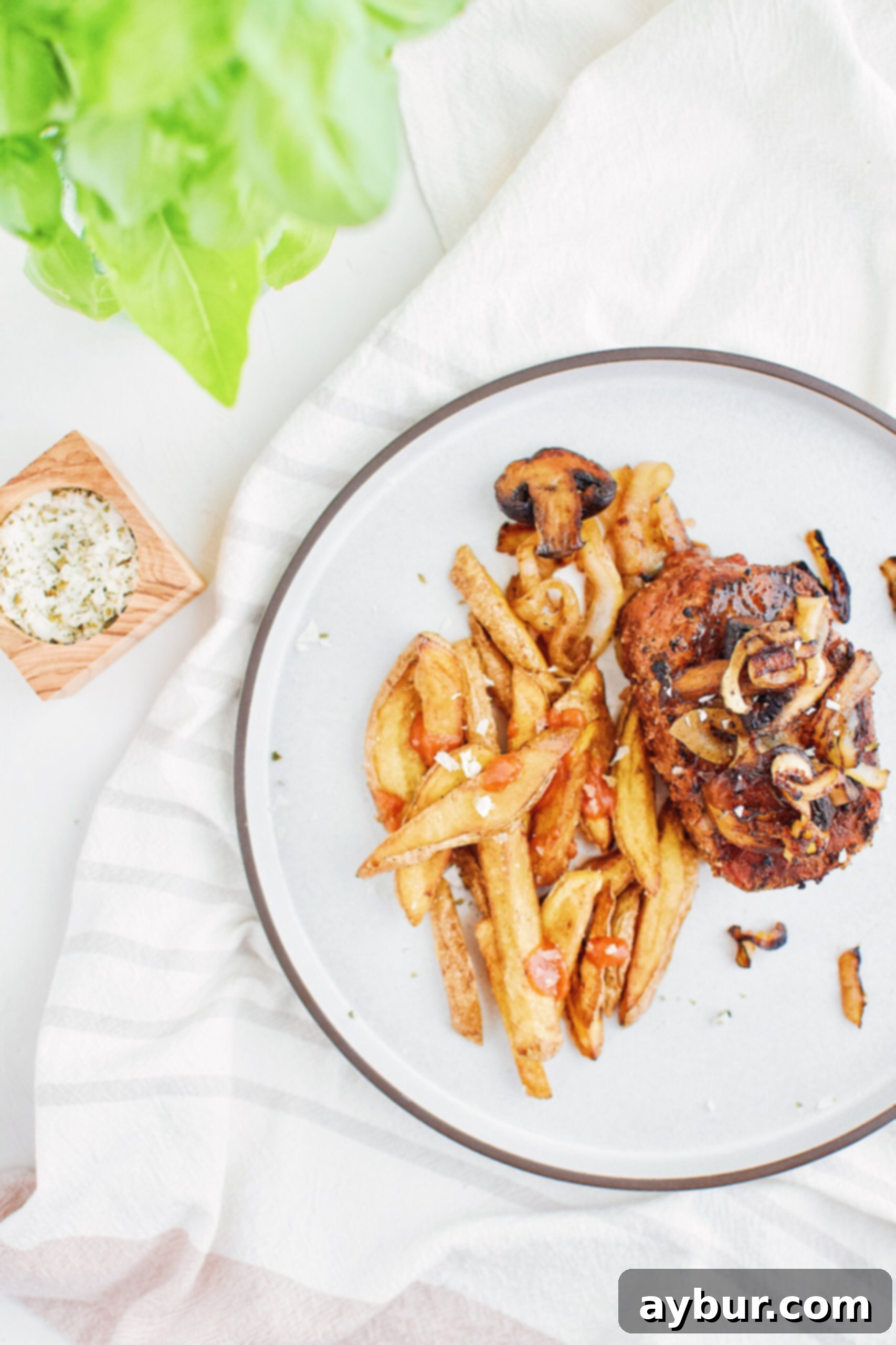 Homemade Fries Made Easy 7 A serving of perfectly twice-fried Easy Homemade French Fries, ready to be enjoyed