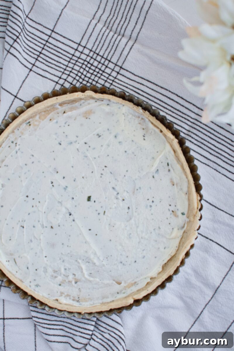 Savory Parmesan Pastry 6 Parmesan Pie Crust, par-baked and topped with Boursin cheese