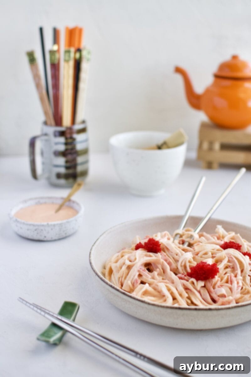 Mixed shredded crab sticks with spicy mayo, a key layer for the Ahi Tuna Tower recipe, with optional caviar on top.