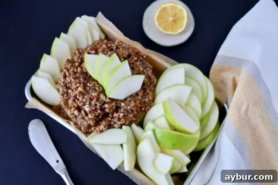 The Ultimate Gluten-Free Baked Brie 2 Baked Brie with a golden brown sugar and pecan topping, fresh out of the oven.