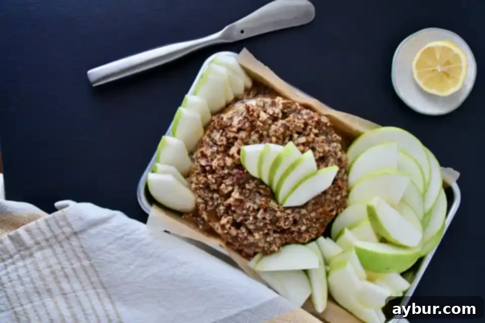 The Ultimate Gluten-Free Baked Brie 5 Close-up of the delicious, caramelized brown sugar and pecan brittle on the baked brie.