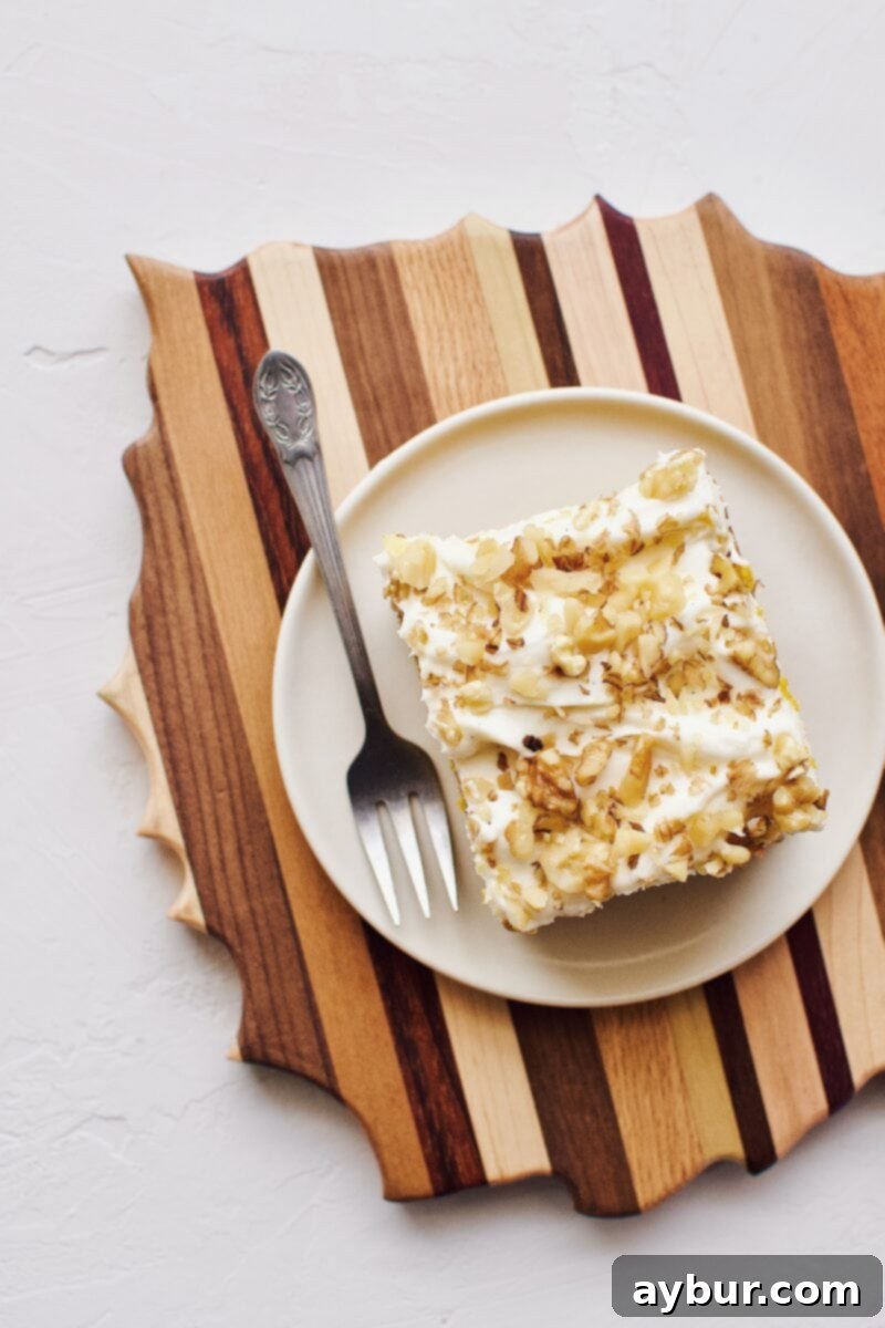 Spiced Pumpkin Walnut Cake with Creamy Cream Cheese Frosting 12 Another view of the sliced pumpkin cake, ready to be enjoyed