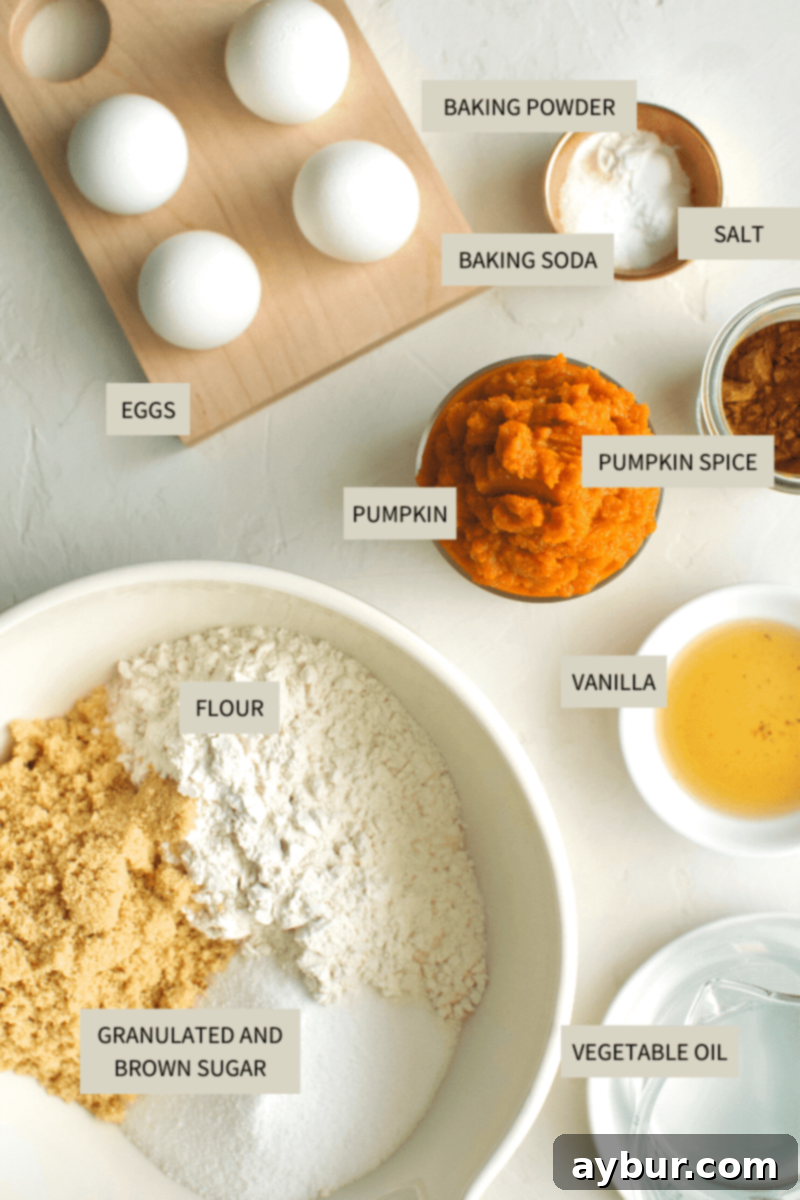 Spiced Pumpkin Walnut Cake with Creamy Cream Cheese Frosting 3 A comprehensive ingredient photo showing all the essentials for making the pumpkin cake and cream cheese frosting