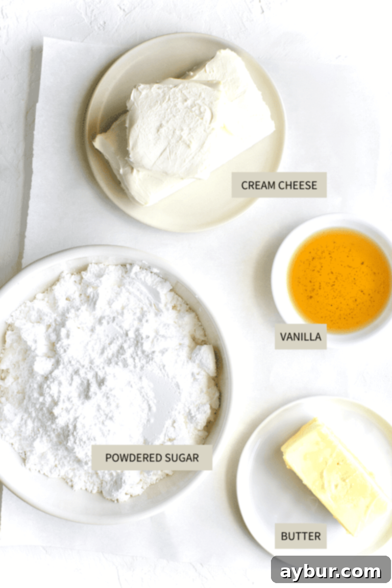 Spiced Pumpkin Walnut Cake with Creamy Cream Cheese Frosting 7 Ingredients for cream cheese frosting laid out: butter, cream cheese, and powdered sugar