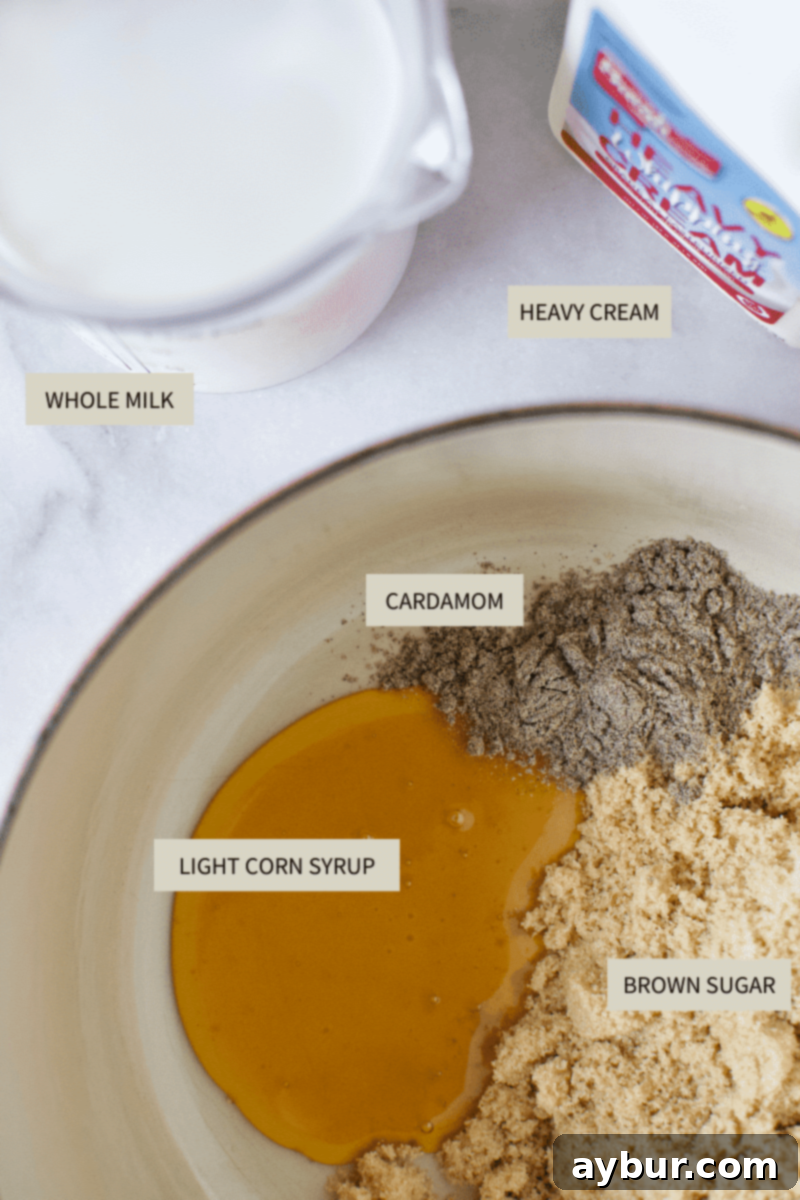 A collection of ingredients for the creamy ice cream base, including milk, cream, and sugars.