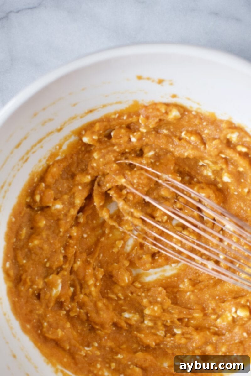 Whipped pumpkin puree and cream cheese mixture, smooth and ready.